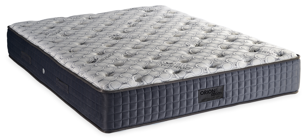 878 Filoxenia Bio Thermo Cotton Cool Max Hyper Soft Ultra Heavy Foam 5000 — Angled view: white textured quilting and a grey fabric border with vertical stitching. Feel: very firm. Anatomical mattress.