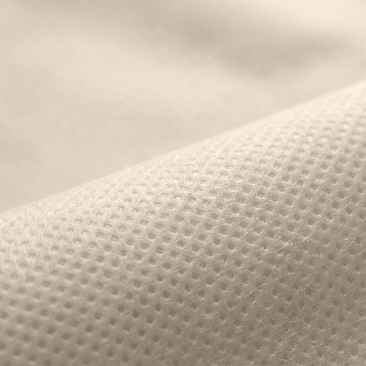 Ύφασμα NON WOVEN 70gr σε ανοιχτό μπεζ, διαθέσιμο σε πλάτος 160cm, για επενδύσεις και διακοσμητικές εφαρμογές.