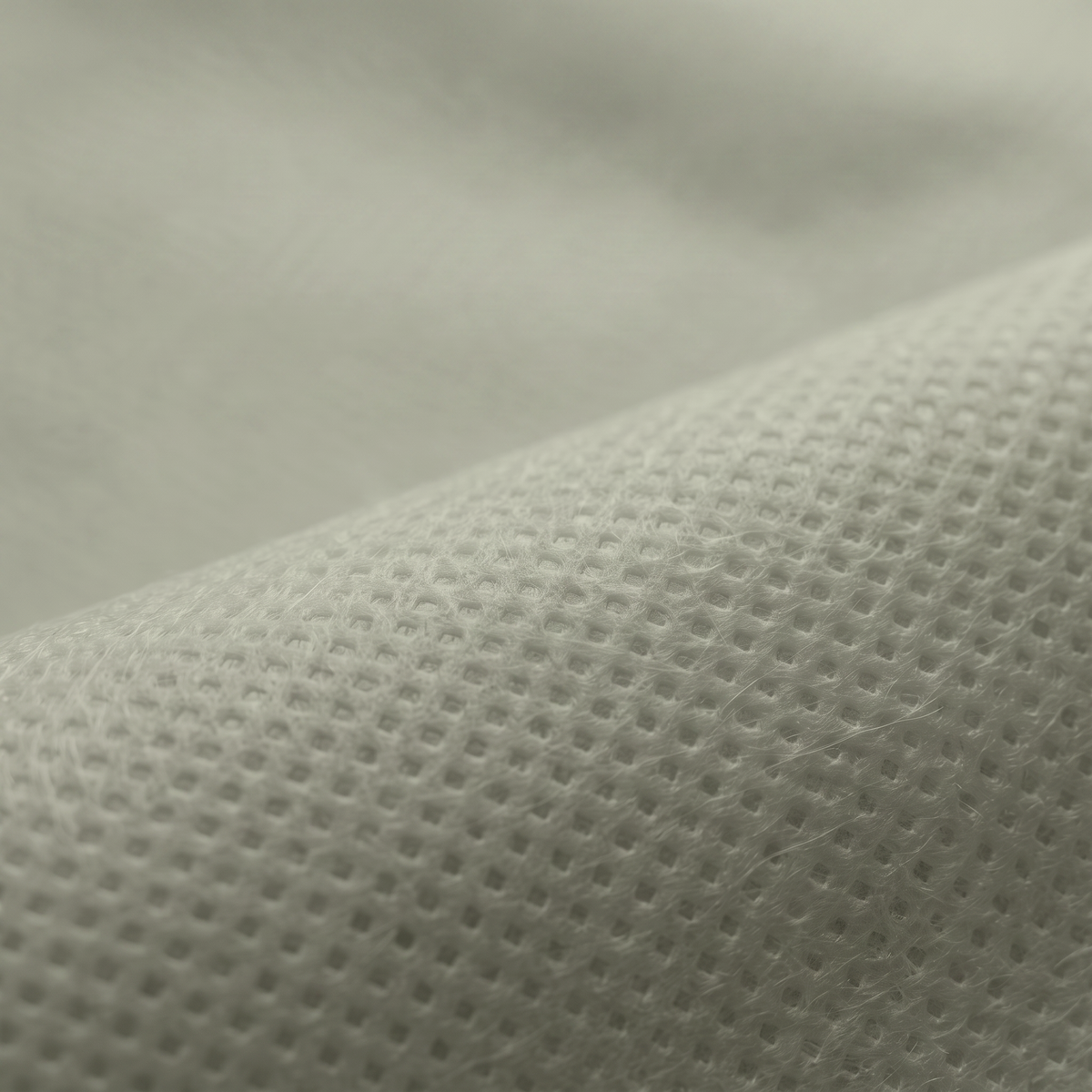 Ύφασμα NON WOVEN 70gr σε εκρού, διαθέσιμο σε πλάτος 160cm, για επενδύσεις και διακοσμητικές εφαρμογές.